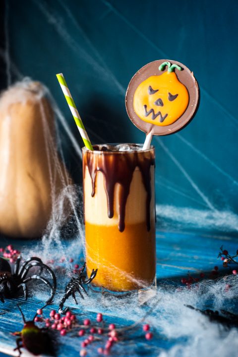 Pumpkin,Halloween,Cocktail,With,Chocolate,Candy